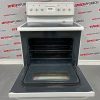 Used Frigidaire White stove CFEF322CS1 open