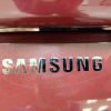 Used Samsung red washer and dryer set WF42H5500AFA2 and DV42H5600EFAC logo