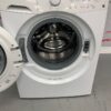 Used Frigidaire Washer and Dryer Stackable Set CAQE7001LW0 and FFFW5000QW0 washer open