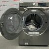 Floor Model Samsung Front Load 27” Washing Machine WF45R6100AP open