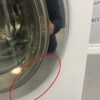 Used GE Front Load 24” Washing Machine WCVH4800K2WW damage