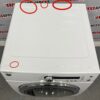 Used GE 24” Front Load Washer and Dryer WCVH4800K2WW PCVH480EK0WW Set dryer damage top