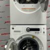 Used GE 24” Front Load Washer and Dryer WCVH4800K2WW PCVH480EK0WW Set stacked open doors