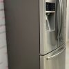 Used Samsung 33” French Door Refrigerator RF26J7510SRAA side photo