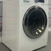 Used GE 24” Front Load Washing Machine WCVH4800K2WW side