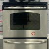 Used GE 30” Freestanding Glass Top Stove JCBP660ST1SS damage front